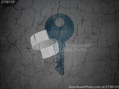 Image of Safety concept: Key on grunge wall background