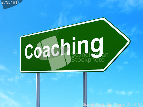 Image of Education concept: Coaching on road sign background