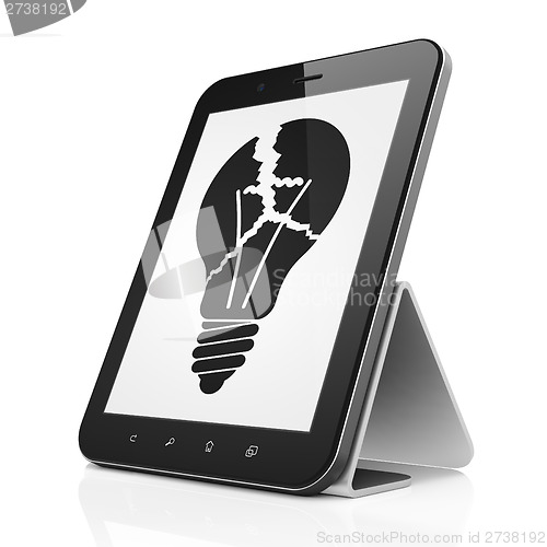 Image of Finance concept: Light Bulb on tablet pc computer