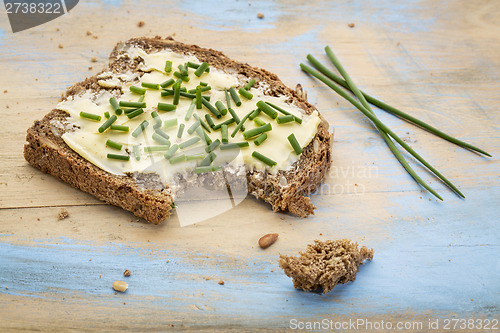 Image of rye bread with butter and chive