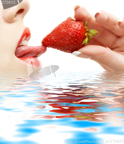Image of strawberry, lips and tongue in water