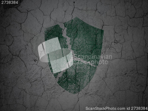 Image of Security concept: Broken Shield on grunge wall background