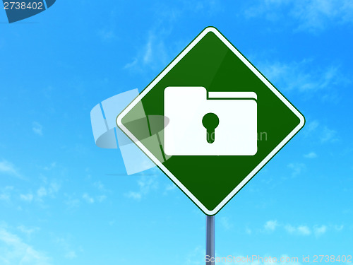 Image of Business concept: Folder With Keyhole on road sign background