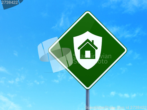 Image of Business concept: Shield on road sign background