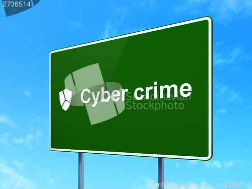 Image of Safety concept: Cyber Crime and Broken Shield on road sign