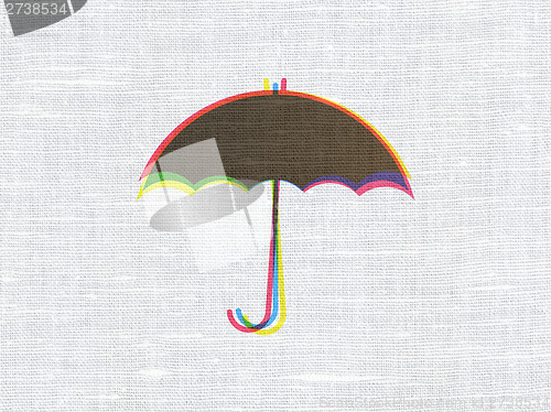 Image of Protection concept: Umbrella on fabric texture background