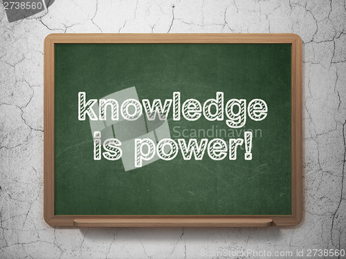 Image of Education concept: Knowledge Is power! on chalkboard background