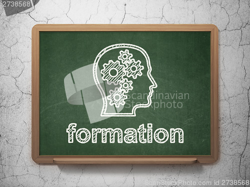 Image of Education concept: Head With Gears and Formation