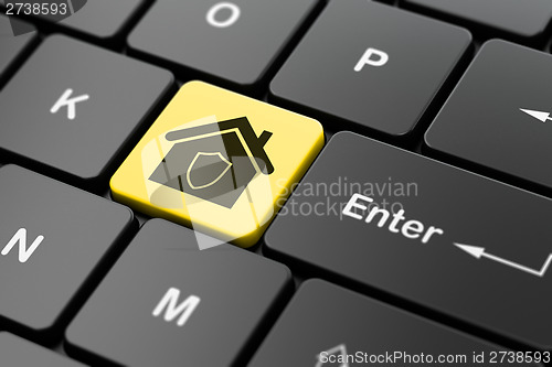 Image of Finance concept: Home on computer keyboard background