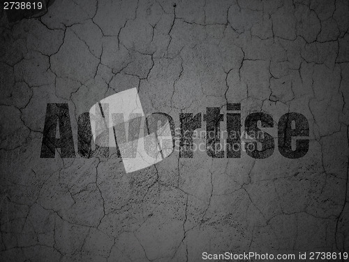 Image of Advertising concept: Advertise on grunge wall background
