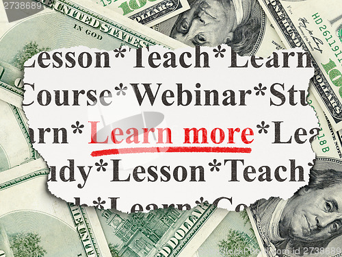 Image of Education concept: Learn More on Money background