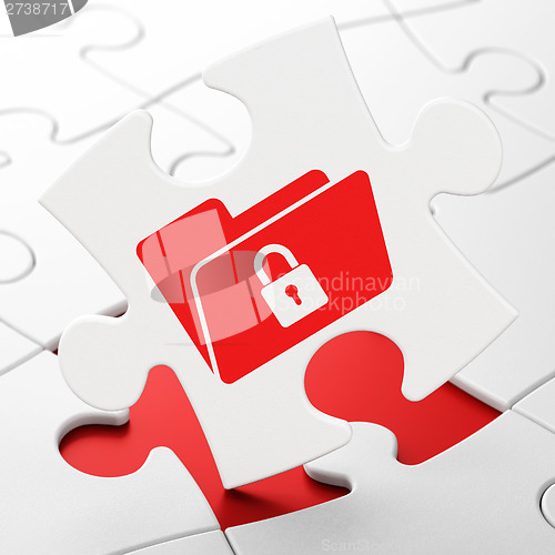 Image of Finance concept: Folder With Lock on puzzle background