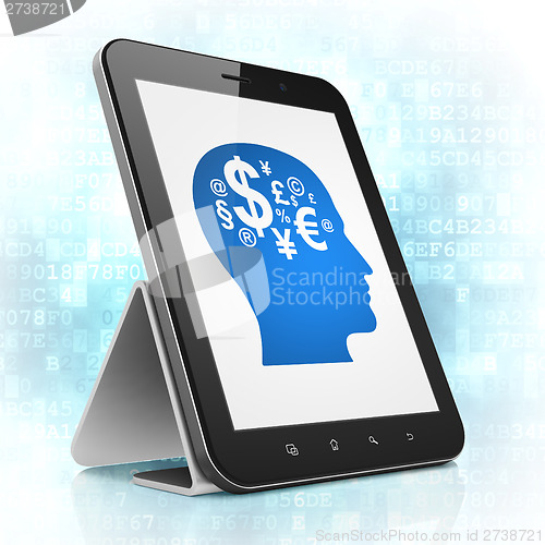 Image of Business concept: Head With Finance Symbol on tablet pc computer