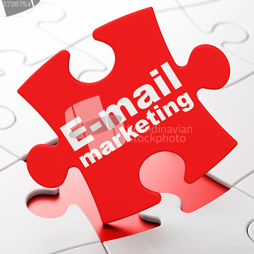 Image of Advertising concept: E-mail Marketing on puzzle background