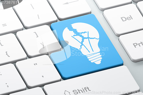 Image of Business concept: Light Bulb on computer keyboard background