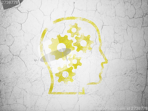 Image of Marketing concept: Head With Gears on wall background