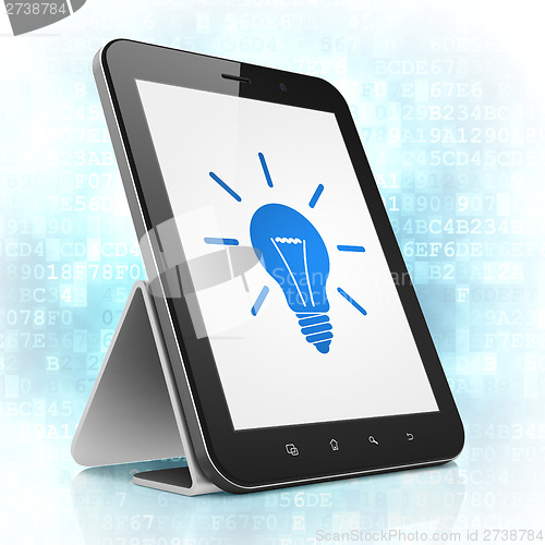 Image of Finance concept: Light Bulb on tablet pc computer