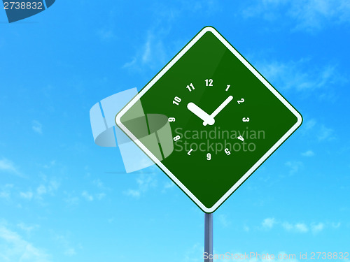 Image of Timeline concept: Clock on road sign background