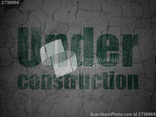 Image of Web design concept: Under Construction on grunge wall background