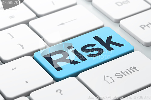 Image of Finance concept: Risk on computer keyboard background