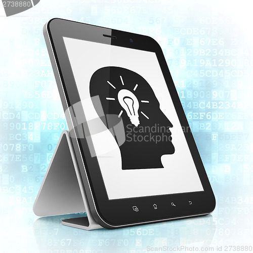 Image of Advertising concept: Head With Light Bulb on tablet pc computer