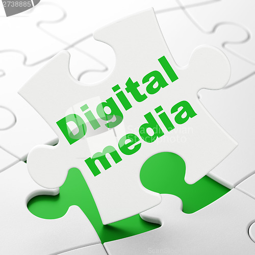 Image of Marketing concept: Digital Media on puzzle background