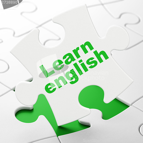 Image of Education concept: Learn English on puzzle background