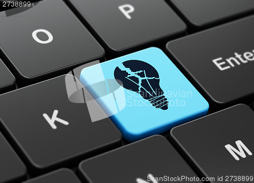 Image of Business concept: Light Bulb on computer keyboard background