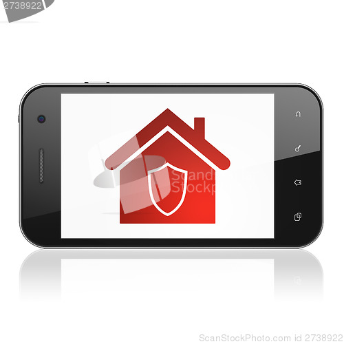 Image of Finance concept: Home on smartphone