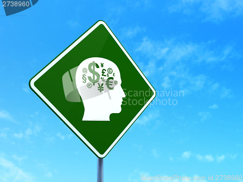 Image of Advertising concept: Head With Finance Symbol on road sign