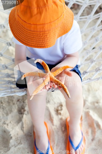 Image of kid at the beach