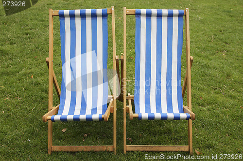 Image of stripped empty deckchairs