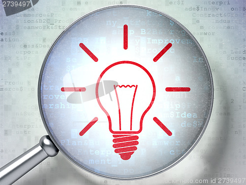 Image of Finance concept:  Light Bulb with optical glass on digital