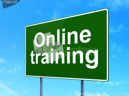 Image of Education concept: Online Training on road sign background
