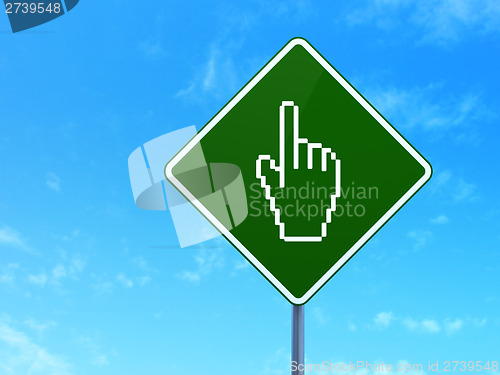 Image of Web development concept: Mouse Cursor on road sign background