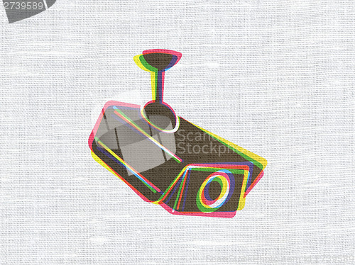 Image of Protection concept: Cctv Camera on fabric texture background