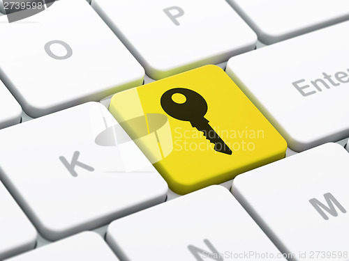 Image of Security concept: Key on computer keyboard background