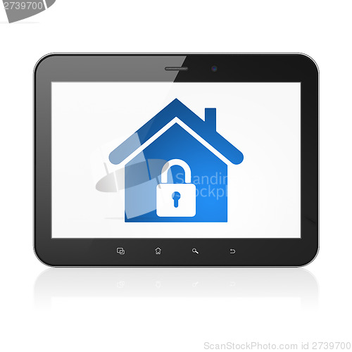 Image of Finance concept: Home on tablet pc computer
