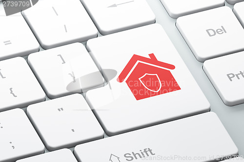 Image of Security concept: Home on computer keyboard background