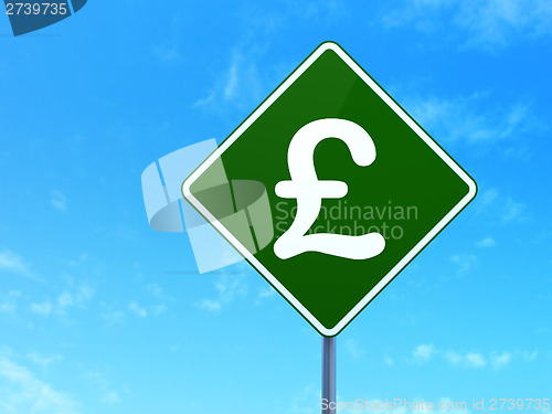 Image of Currency concept: Pound on road sign background