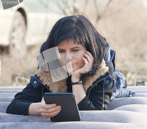 Image of Woman with ebook