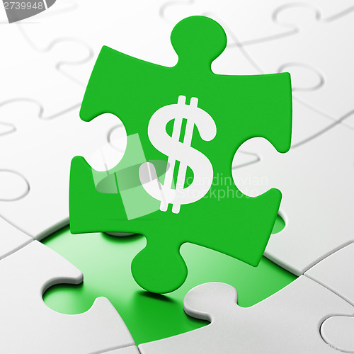 Image of Currency concept: Dollar on puzzle background