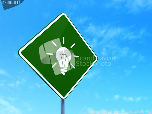 Image of Business concept: Light Bulb on road sign background