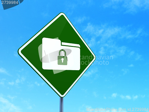 Image of Business concept: Folder With Lock on road sign background