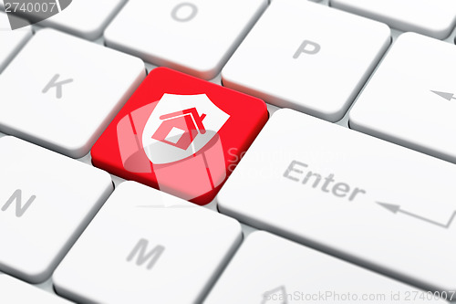 Image of Business concept: Shield on computer keyboard background