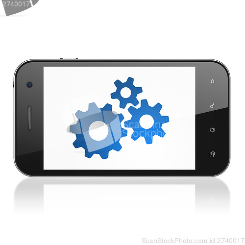 Image of Data concept: Gears on smartphone