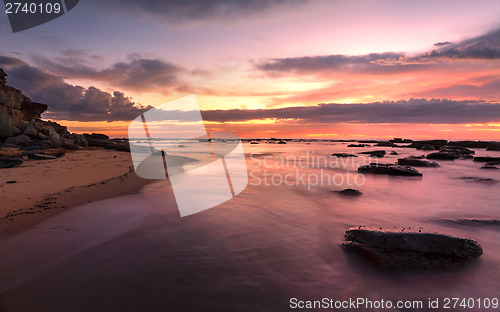 Image of Magnificent sunrise high tide at Bateau Bay rockshelf