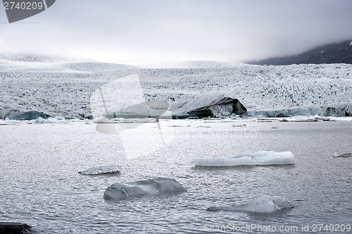 Image of Mountain, iceberg and lagoon. Iceland