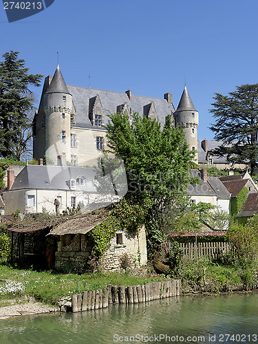 Image of Montresor village and castle seen from the Indrois river, France