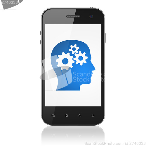 Image of Education concept: Head With Gears on smartphone